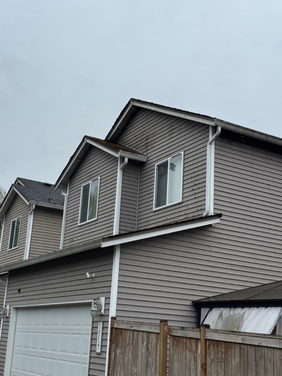 House exterior and roof soft wash in King County WA — before